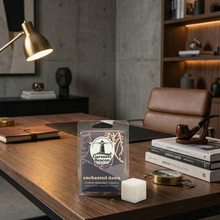 Garnett Beacon wax melt packaging on a wooden desk with decor items