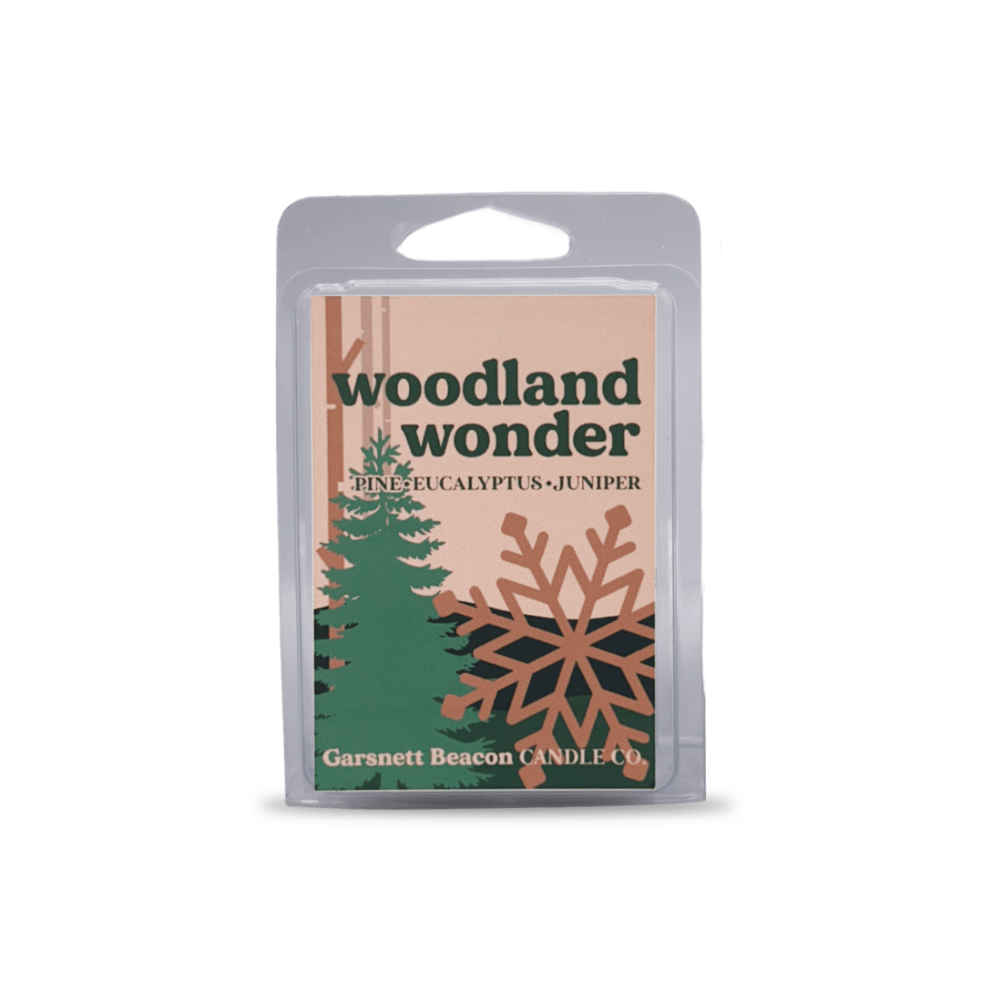Woodland Wonder wax melt packaging with a white wax melt on a light blue background