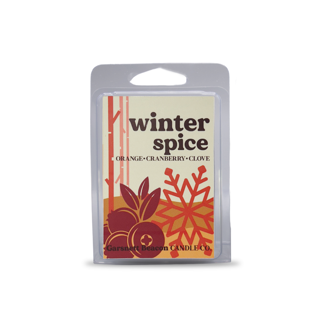 Winter spice wax melt with orange slices, cranberries, and cloves on a light blue background